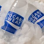 electrolyte supplements for summer Pakistan – Chilled Pocari Sweat bottles resting in ice, showcasing hydration and refreshment.