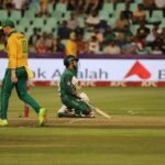 US electrolyte supplements for cricket players Pakistan – Dynamic cricket scene with players in action on the field during a match.