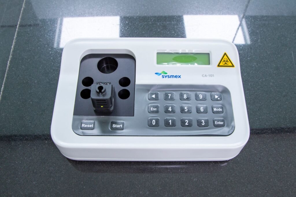 spectrophotometer price in pakistan – Close-up of a lab device with numeric keypad and display, perfect for technology themes.