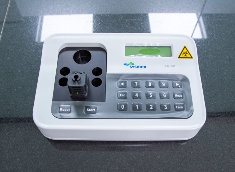 spectrophotometer price in pakistan – Close-up of a lab device with numeric keypad and display, perfect for technology themes.